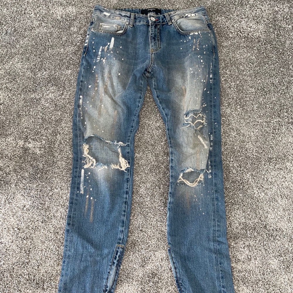 Ripped paint splatter jeans